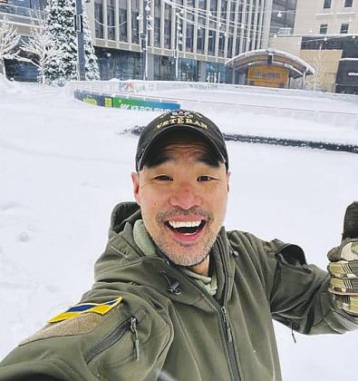 Mark J. Lindquist gears up for his mission starting in Broadway Square in Fargo.