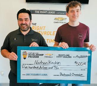 Al Berry presents a check for a $500 Scholarship to Nathan Kitchin of Langdon on behalf of Birchwood Chevrolet in Cavalier and Heartland Chevy Dealers. Nathan's application was chosen as the runner-up of all applications received.