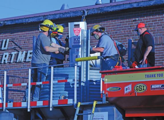 Drayton Volunteer Fire Department had training on grain bin rescue last week. Pictured are a group of firemen being instructed during a mock rescue. VNV Photo by Lesa Van Camp