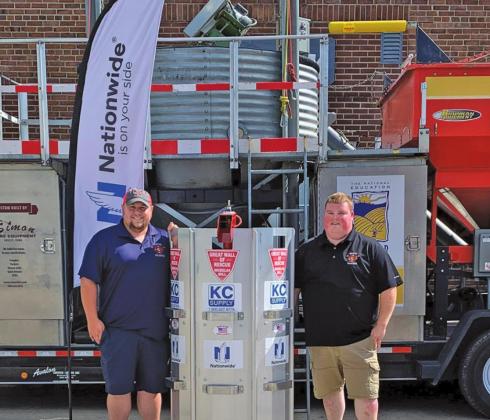 Jordan Grundstrom and Robbie Corrick with the new equipment that will help them with grain bin rescues. Photo submitted