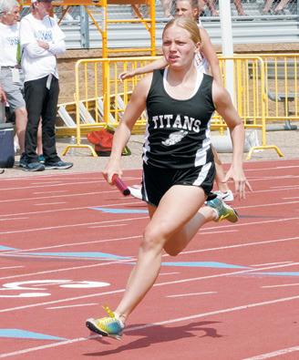 Reese Fering running her leg of the 4X400 meter relay.