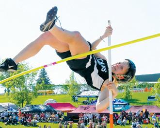 Alyssa Hoyles soaring over the pole at the state meet.