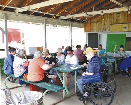 Wedgewood Manor residents and staff participate in Bingo at the Zaggs building. Photo by Larry Stokke