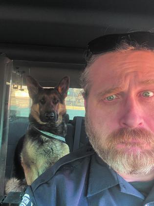Freeway riding with his adopted dad, Ian, on their way to work.