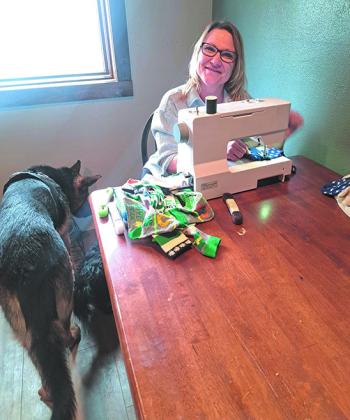 Jamie Mattice has been busy making Velcro socks to cover Freeway’s wounded paw.