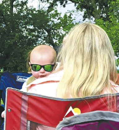 Kolter Michael Dahl, son of Katie &amp;amp; Kameron Dahl was keeping it cool during the service in his shades.