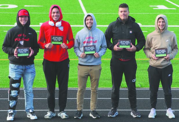 Bombers All-Region team members Hunter Johnson, Mason Pollestad, Trenten Bronson-Keena, and Carter Johnson. Photo by Lyle Van Camp