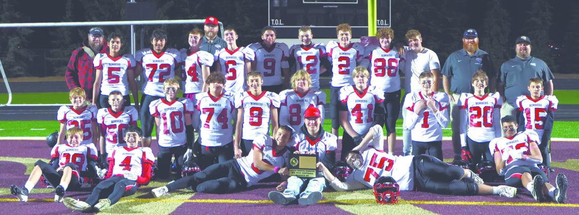 The Bombers gather for one last team photo after the championship game in Minot. Photo by Lyle Van Camp