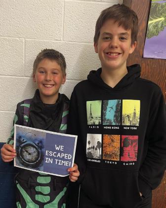 Jasper Halvorson (4th grade) and Gavin Cole (volunteer) were the first to solve the escape room puzzles