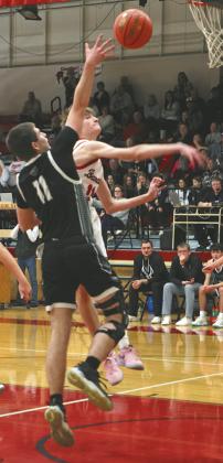 Evan Feltman shoots past a North Star defender.