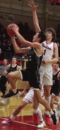 Isaac Feltman shoots past North Star's Brett Dilley.