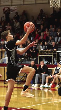 Quinn Passa puts up a layup late in the North Star game.
