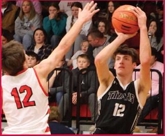 Everett Fedje shoots over North Star's Hunter Hagler.