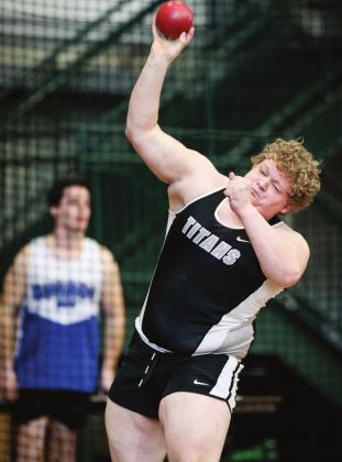 Bryce Wimpfheimer puts the shot during the Red River Valley Conference Indoor Track Meet last Friday Night at UND . Photo by Cole Short courtesy of Hillsboro Banner