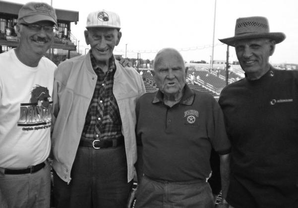 Bob Morris in his American Legion shirt with Robert Van Camp at the 2009 American Legion World Series in Fargo. Pictured left to right: Paul Van Camp, Robert Van Camp, Bob Morris, and Clinton Van Camp Photo submitted by Clint Van Camp