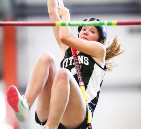 Easton Larson has her eye on the bar as she makes an attempt to clear in in the pole vault at UND. Photo by Cole Short courtesy of Hillsboro Banner