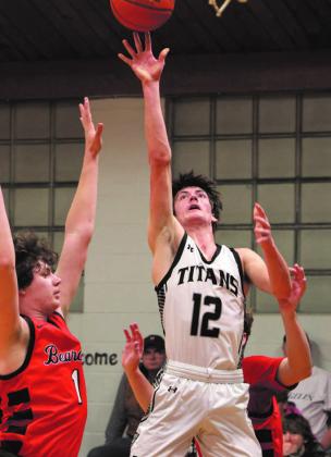 Everett Fedje shoots through a crowd in action against North Star.