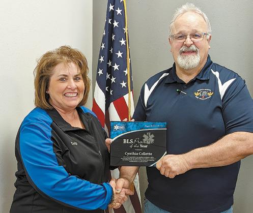 Bill Tuttle and Cynthia Collette after she was surprised with her award. Photo submitted by Bill Tuttle.
