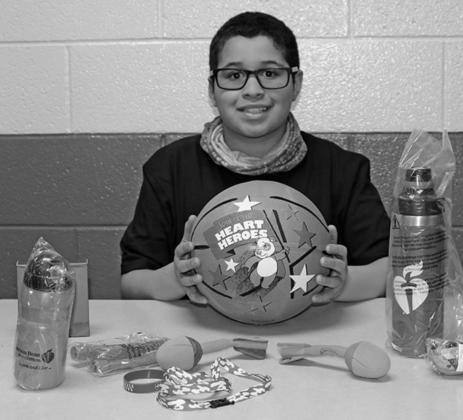 Pictured above: Jerimiah Johnson with some of his thankyou gifts. Photo provided by Drayton Public School