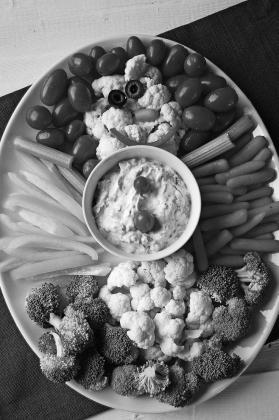 This snowman veggie platter makes a great contribution to a holiday potluck. (NDSU photo)