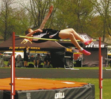 DVE junior Jack Langerud wins mens high jump and secures a place in the state competition as he clears 6' 2'. Photo by Jamie Rarick