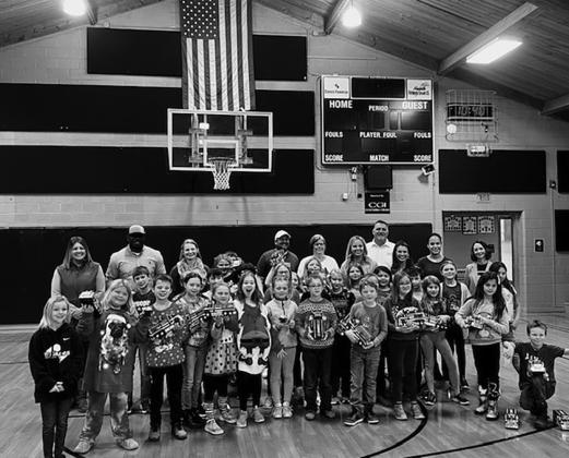 Hess donates toy trucks to elementary schools in North Dakota