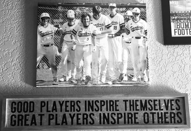 Hanging on the wall with many of his sports photos is this inspirational plaque that serves as a reminder of what participation in sports is all about. Submitted photo