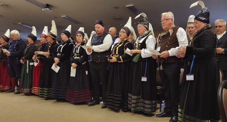 The Annriki group sings the Icelandic National Anthem in preparation of their fashion show and heritage program. Photo by Hilary Nowatzki.