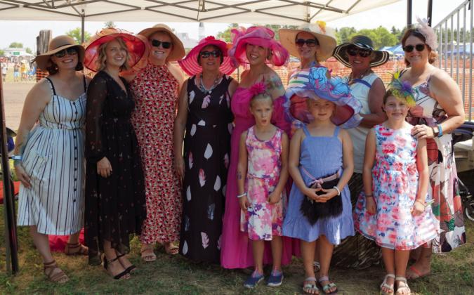 This group of ladies dressed in their Sunday best for the worship service at the historic Vikur Church. Photo by Larry Stokke.