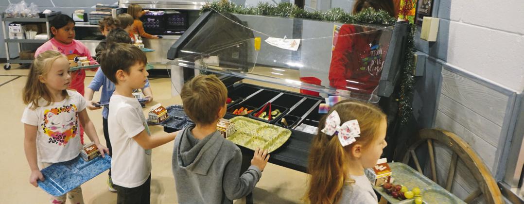 Kindergarten students at Roosevelt Elementary School in Bismarck line up for lunch on Dec. 9, 2022. Photo Michael Standaert.