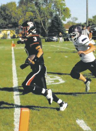 Trenten Keena crosses the goal line for the first touchdown of the game against Parshall. Photo by Jamie Rarick.