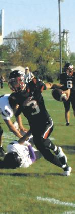 Trenten Keena breaks a tackle to extend the drive. Photo by Jamie Rarick.