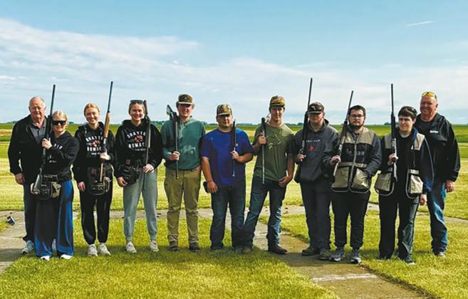 The Bombers Trap Team. From left Coach Leland Bratlie, Nulla Thompson, Peyton Larson, Reegan Aasand, Lincoln Aasand, Carlos Quezada, Ryan Corrick, Jaxon Wilson, Gunnar Kuznia, Loki Skylar, Coach Michael Larson, (not pictured Lucas DeSouza). Photo by Angela Aasand