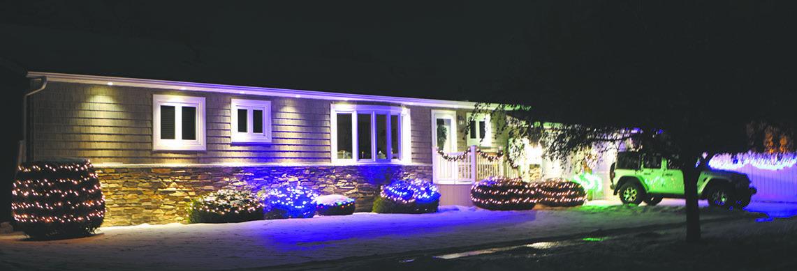 The Todd and Nancy Woinaowicz home, lit up for Christmas. Photo by Lyle Van Camp