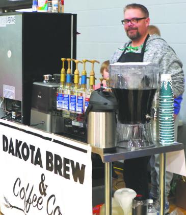 Matt Vold sold coffee at the Crafters Market representing Drayton's newest business Dakota Brew &amp;amp; Coffee Co. during Old Fashioned Christmas. Photo by Lyle Van Camp
