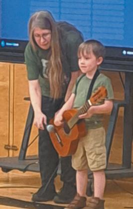 Mac Vold, son of Matt and Maggie Vold, was one of the young performers at the DPS talent show May 14. Photo by Christine Jensen