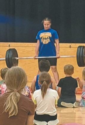 Kilaynah Smith’s talent was deadlifting weights at the DPS talent show. Photo by Christine Jensen