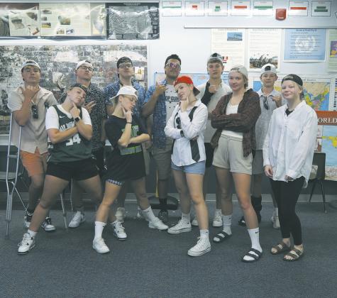 The senior class dressed for Frat Boy Day. (Back: Hunter Johnson, JJ Knudson, Ian Peterson, Daniel De Souza, Quinn Passa, Drew Passa Front: Aleah Pokrzywinski, Reese Fering, Rylee Maurstad, Easton Larson, Ellie Haltom. Photo by Jamie Rarick