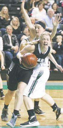 While in contention for the championship round while facing the Titans’ continual nemesis at the time, Thompson, Laiken Larson wound up with the ball in the Tommies end of the court. Cornered by two Thompson defenders, everything fell into place for a near perfect photo.