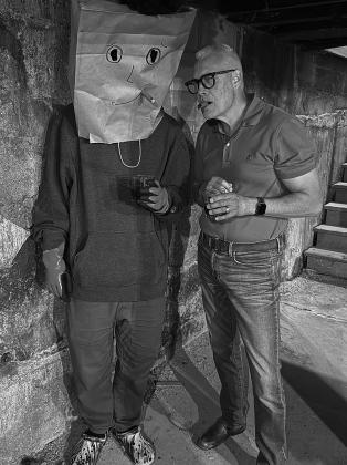 Yours truly with Mr. X in a sewer enjoying cigars and old fashions. Interviewing is hard work.