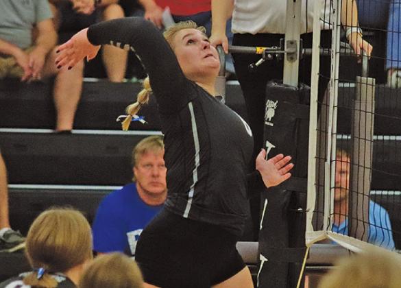 Ella Kittelson goes up for the kill against the Burros last Thursday night. VNV Photo by Lesa Van Camp