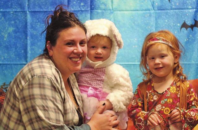 Megan Kalka and her daughters Hadley and Everly stopped by the photo booth at the carnival held in the Drayton Public School gymnasium last Saturday to celebrate Halloween. Photo submitted by Caity Ryan