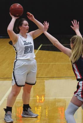 Madison Hermanson loks for an open team mate in action in Edinburg Saturday. VNV photo by Erich Hoyles
