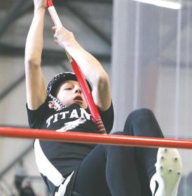 Carter Johnson approaches the bar in the pole vault last Friday evening. Photo by Lyle Van Camp.