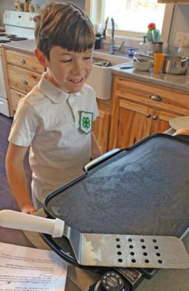 Beau Wieler prepares to demonstate how to make his special egg sandwich. Photo submitted
