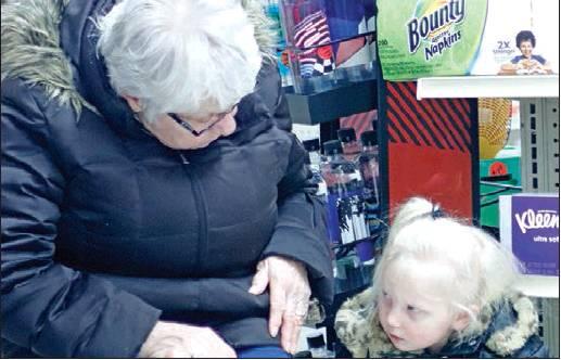 Jubilee Culver pictured right found a new friend in Margret Staskivige (left) at the annual Christmas Taster at J &amp;amp; D’s Riverview Market last Thursday evening. VNV Photo by Lesa Van Camp
