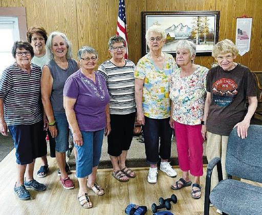 From left to right, Marilyn Paulson, Jan Aasand, Marlene Aasand, Janice Gabbert, Gail Peil, Lorna Anderson, Margret Staskivige, and Saralee Hoselton. Photo by Christine Jensen