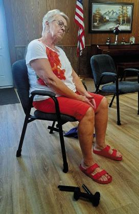 Shelia Peterson stretching at Bone Builders. Photo by Christine Jensen.