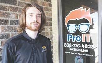 Travis High outside the offices of his employer ProIT in Minot, Sept. 6, 2022. Photo provided by Travis High.