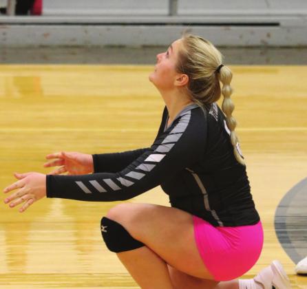 Ella Kittelson tries to will the ball over the net at Edinburg last week. VNV photo by Lyle Van Camp